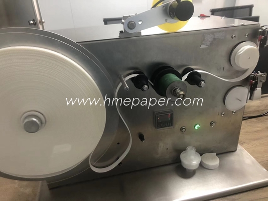 comprar Máquina automática de bobinado de cinta de papel de filtro HME SUS304 Corte manual de cinta controlada por PLC online manufacture